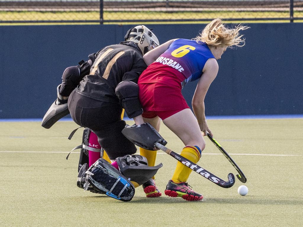 Toowoomba keeper Sarah Steinhardt and Talicia Canty, Brisbane. Toowoomba 1 vs Brisbane. Hockey Queensland Championship at Clyde Park, Toowoomba. Saturday, May 1, 2021. Picture: Nev Madsen.