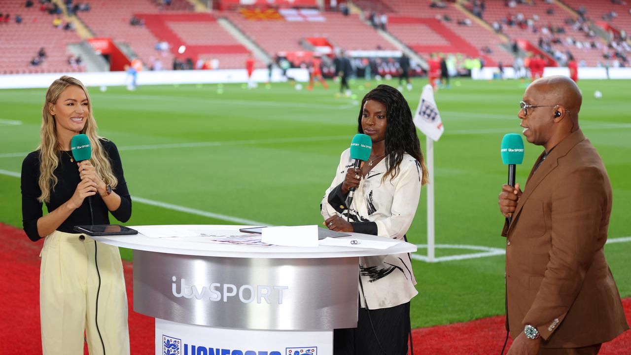 Laura Woods, Eni Aluko and Ian Wright report pitchside for ITV Sport. (Photo by Catherine Ivill/Getty Images)