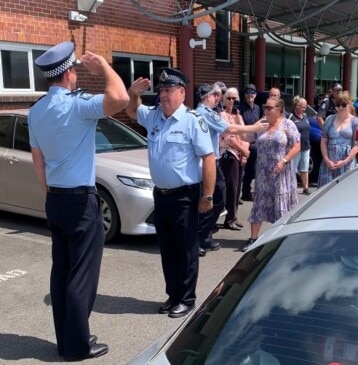 Piping out ceremony for Sergeant Tim Marrinan as he leaves Bundaberg Police station for the last time