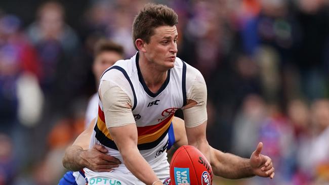 Matt Crouch of the Crows achieved a personal best disposal haul against the Dogs. Pictured: AAP Image/Scott Barbour