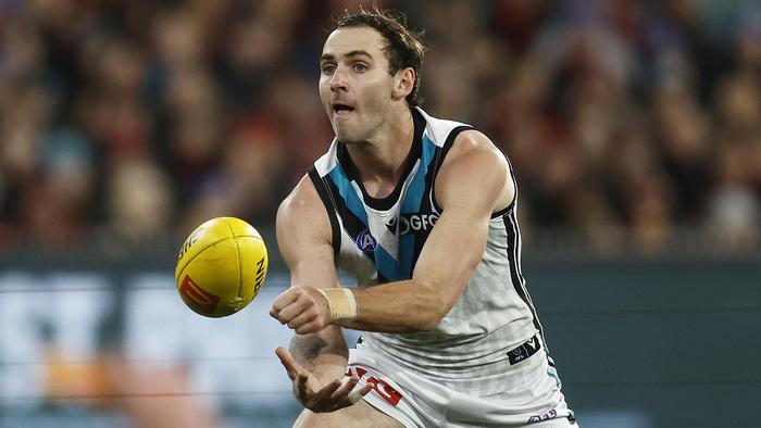 MELBOURNE, AUSTRALIA - JULY 01: Jeremy Finlayson of the Power handballs during the round 16 AFL match between Essendon Bombers and Port Adelaide Power at Melbourne Cricket Ground, on July 01, 2023, in Melbourne, Australia. (Photo by Daniel Pockett/Getty Images)