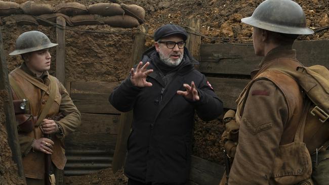 Dean-Charles Chapman, left, director Sam Mendes, centre, and George MacKay on the set of the technically brilliant 1917.