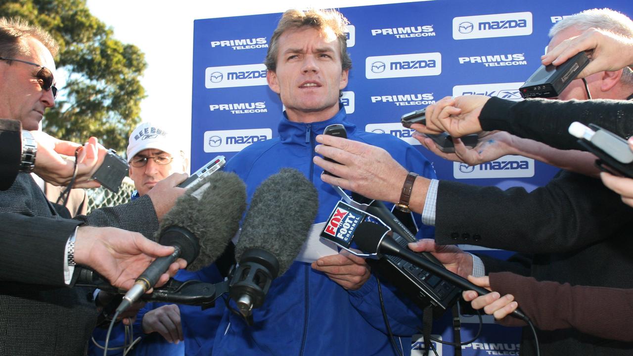 A devastated Laidley reads a statement at training after the tragic suicide of a supporter.