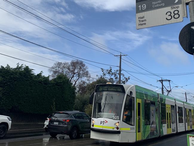 School run chaos after car, tram collision