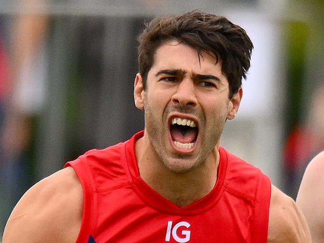 MELBOURNE, AUSTRALIA - FEBRUARY 18: Christian Petracca of the Demons celebrates a goal during an AFL practice match between Melbourne Demons and Richmond Tigers at Casey Fields on February 18, 2024 in Melbourne, Australia. (Photo by Morgan Hancock/Getty Images)