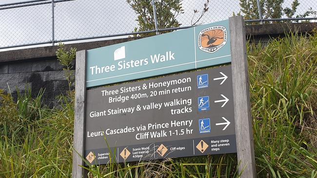 Signage pointing to the Giant Stairway and valley walking tracks in Katoomba. Picture: Isabell Petrinic