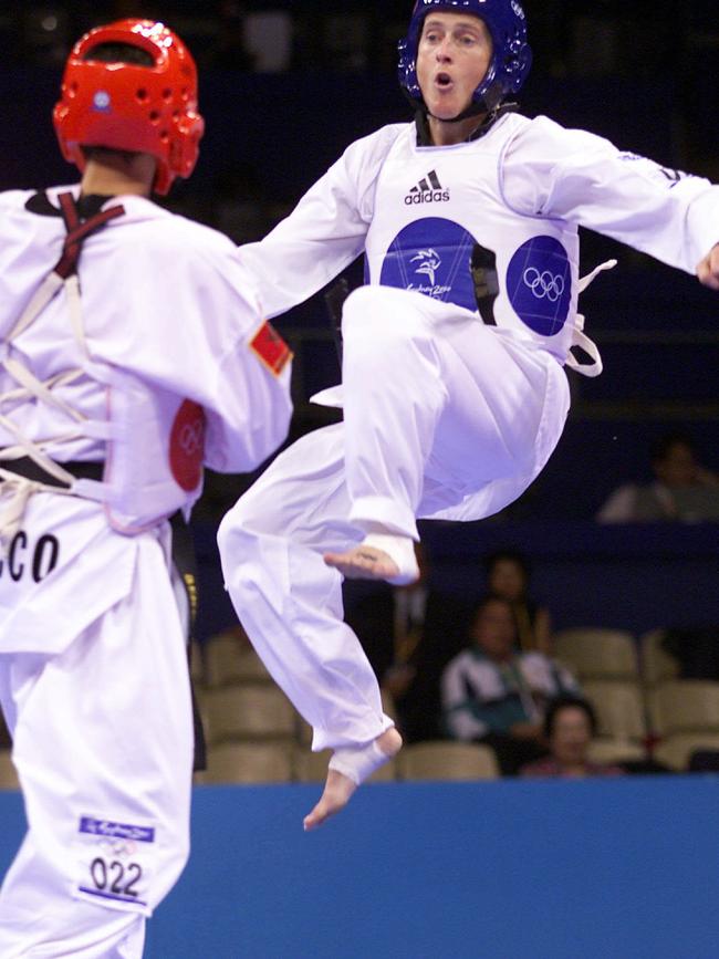 Lyons (blue) vs Younes Sekkat of Morocco in the men's 58kg division of taekwondo at the Sydney Olympics.