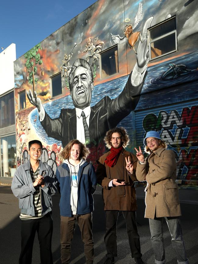 Franco Cozzo band members Maseta Pratama, Alex Wagstaff, Archie Beattie and Sam Sharkey admiring the mural in 2019. Picture: Hamish Blair