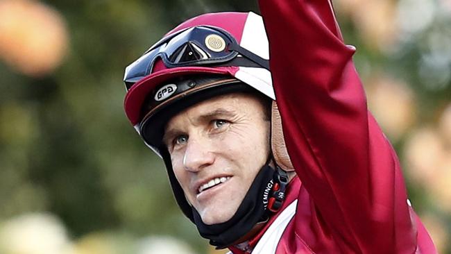 MELBOURNE, AUSTRALIA - NOVEMBER 07: Luke Currie on board Arcadia Queen returns to scale after winning race 8 the Seppelt Mackinnon Stakes during 2020 Seppelt Wines Stakes Day at Flemington Racecourse on November 07, 2020 in Melbourne, Australia. (Photo by Darrian Traynor/Getty Images for the VRC)