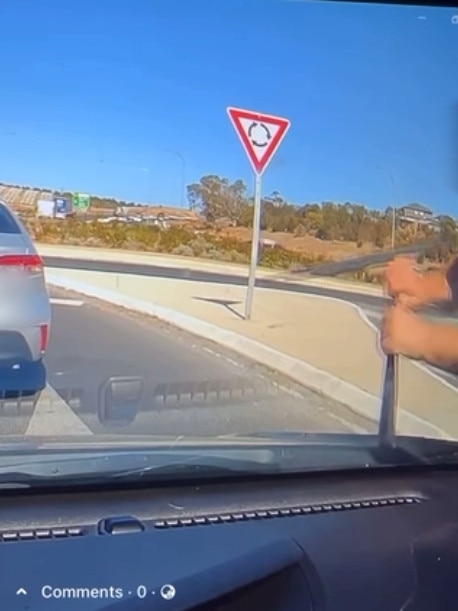 The man is seen ripping off the young woman’s windscreen wiper. Picture: Facebook