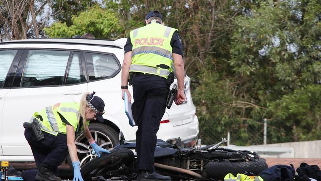 Police at the scene of a fatal accident between a motorbike and a car on Bermuda St Broadbeach Waters. Picture Glenn Hampson