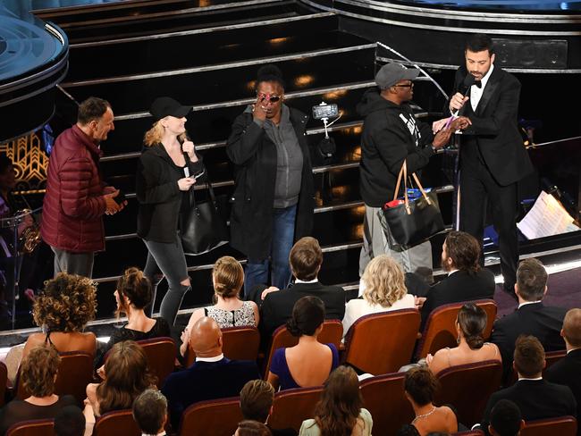 Host Jimmy Kimmel surprises tourists during the 89th Annual Academy Awards. Picture: Kevin Winter/Getty Images