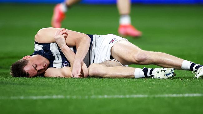 Jeremy Cameron was concussed in a brutal collision with Gary Rohan. Picture: Dylan Burns/AFL Photos via Getty Images