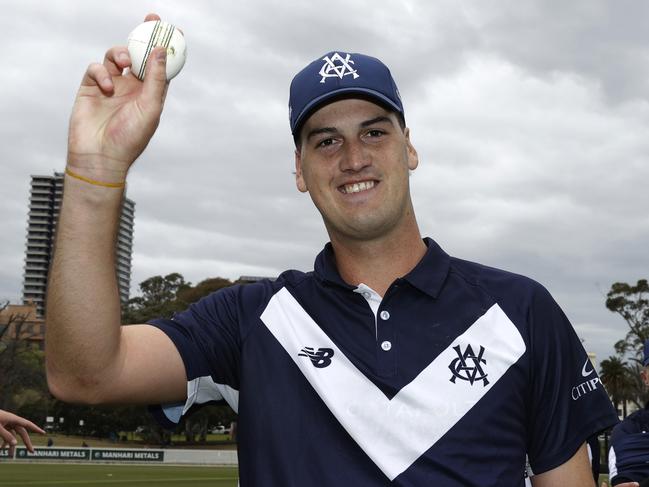 MELBOURNE, AUSTRALIA - SEPTEMBER 23: Sam Elliott of Victoria holds the ball aloft after his best bowling figures of 7 wicket for 12 runs during the ODC match between Victoria and Tasmania at CitiPower Centre, on September 23, 2024, in Melbourne, Australia. (Photo by Darrian Traynor/Getty Images)