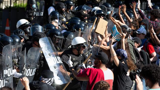 Police clash with demonstrators outside the White House during a protest over the death of George Floyd. Picture: AFP