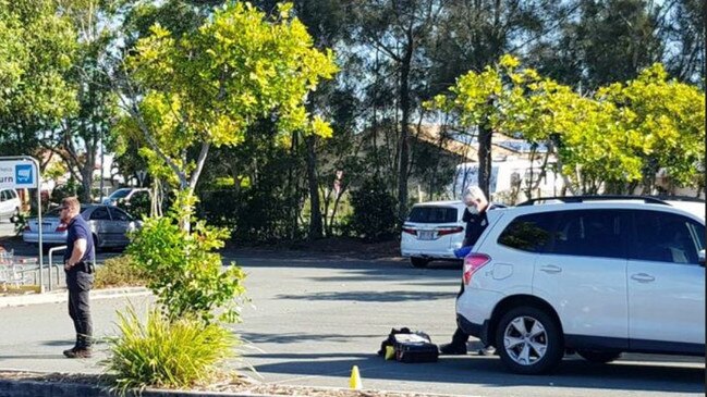 Police outside the Currimundi Markets shopping centre.