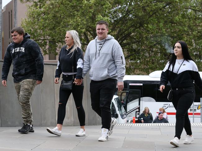 Family and friends of murdered man Jarrod Leigh Turner outside the Supreme Court of Tasmania on Friday.