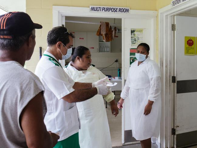 Poutasi District Nurse Manager James Belford verifies medical records with staff nurses. Picture: Infinity Images Fiji