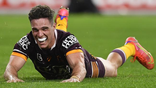 BRISBANE, AUSTRALIA - JULY 30: Brodie Croft of the Broncos scores a try during the round 20 NRL match between the Brisbane Broncos and the North Queensland Cowboys at Suncorp Stadium, on July 30, 2021, in Brisbane, Australia. (Photo by Albert Perez/Getty Images)