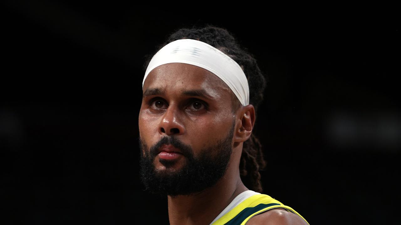 SAITAMA, JAPAN - AUGUST 05: Patty Mills #5 of Team Australia looks on following Team Australia's loss to Team United States in a Men's Basketball quarterfinals game on day thirteen of the Tokyo 2020 Olympic Games at Saitama Super Arena on August 05, 2021 in Saitama, Japan. (Photo by Kevin C. Cox/Getty Images)