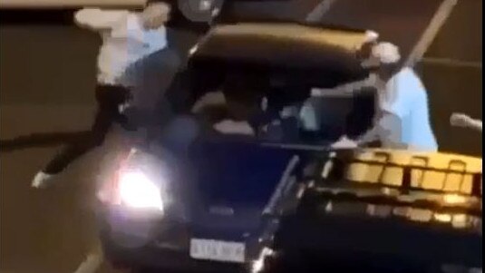 A video showing people attacking the car that then reverses into them outside a Port Elliot hotel . Picture: Supplied