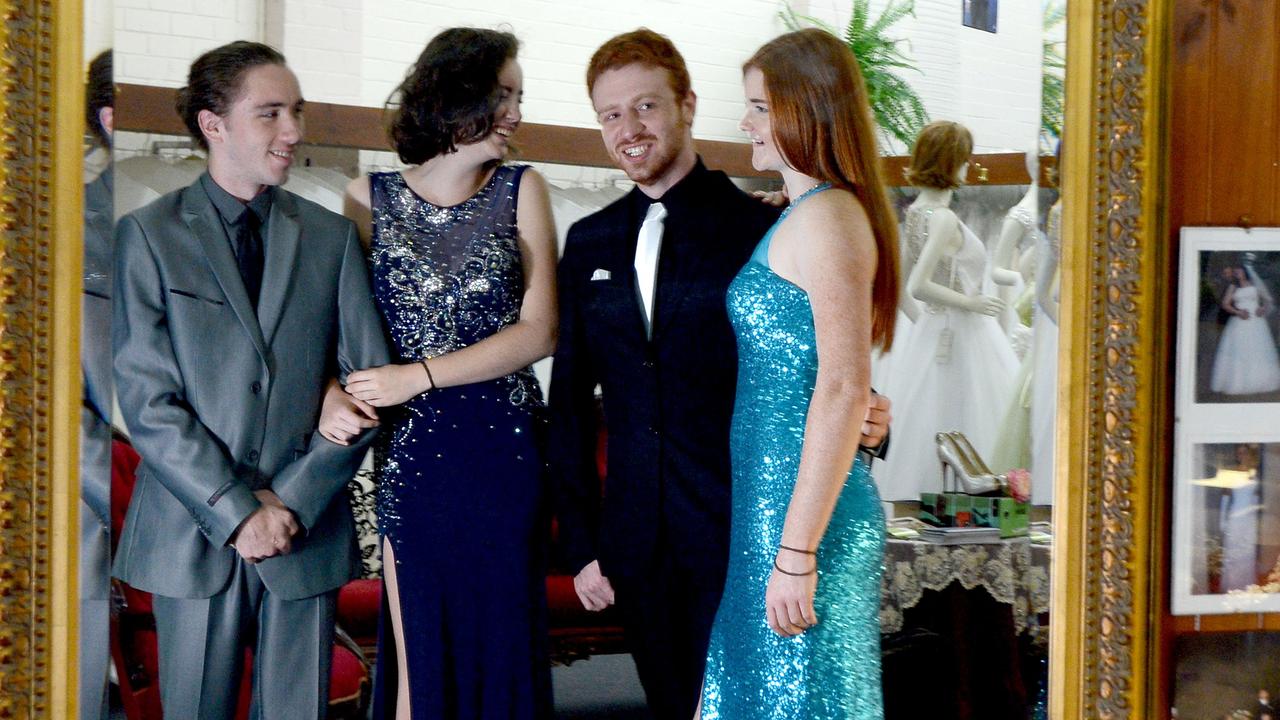 Richmond River High School students, from left Bodhi Towers, Teshan Joy, Ryley Adams and Shannon Richardson, trying on outfits at Mary Vidler Bridal in Lismore for their formal. Picture: Cathy Adams / The Northern Star