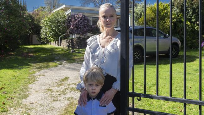 Mount Eliza mother Jessica Swann and her five-year-old son Kariym outside the home they were forced to move from after burglars broke into it twice in a week. Picture: Valeriu Campan