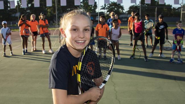 Shaylee Haynes, 11, with fellow ‘little tackers’ at the Edmonton Tennis Club in Cairns yesterday. Picture: Brian Cassey