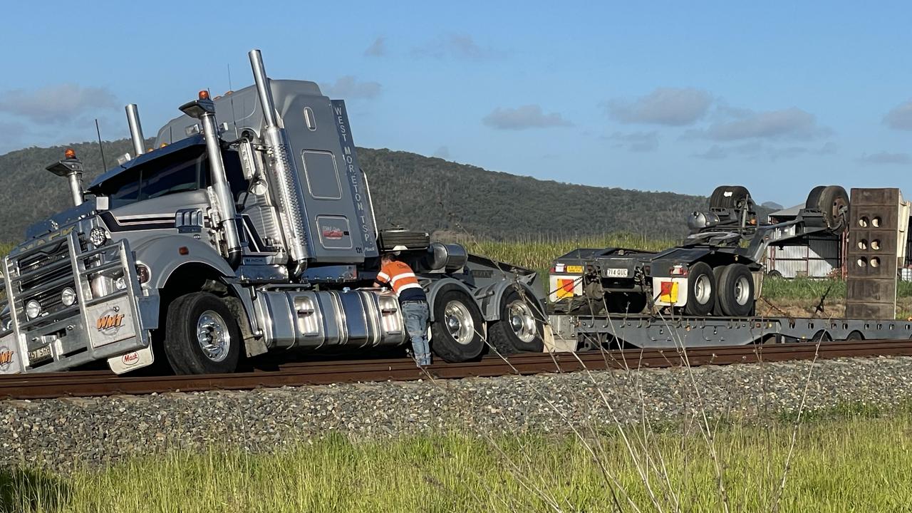 A semi-trailer crash on the Bruce Highway near Koumala left the vehicle sprawled over the train line around 2.50pm on October 15, 2024. Photo taken around 4:40pm. Picture: Fergus Gregg