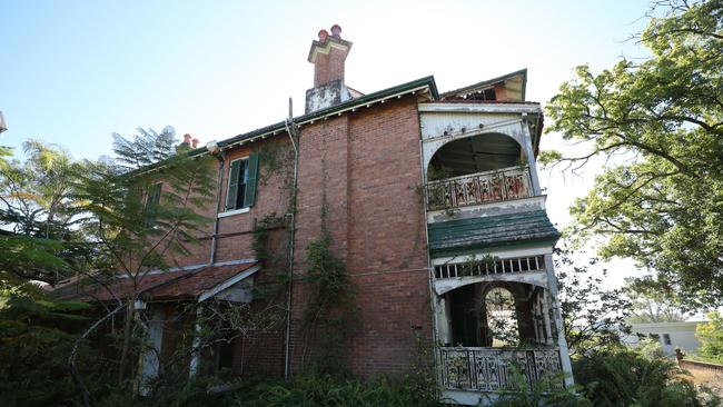 Once-grand verandas are rotting away. Picture: Peter Wallis