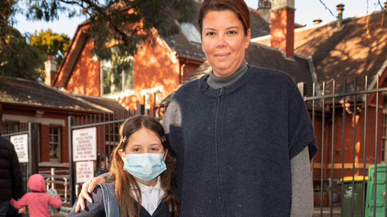 Paula Barbosa with her daughter, Elise, who is happy to wear a mask. Picture: Tony Gough