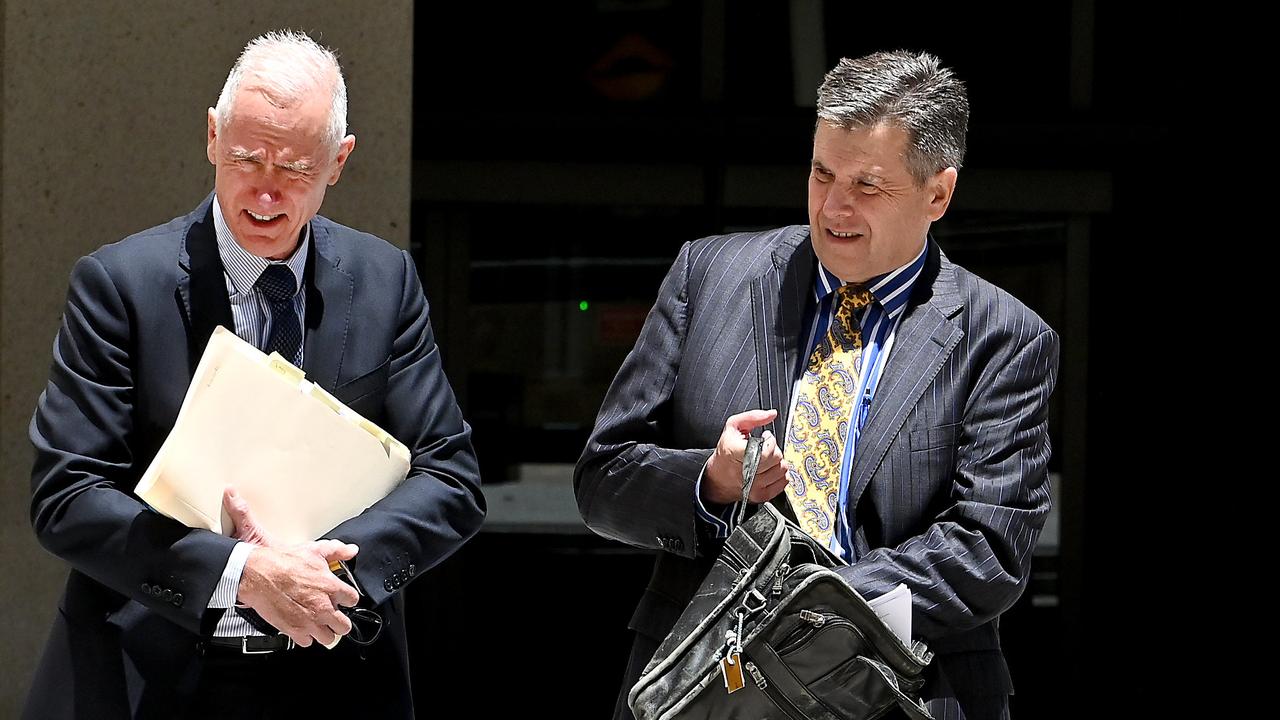 Gold Coast lawyer Beau Hartnett, with his barrister Richard Cowen, leaves the Federal Court where he was attending a hearing into his personal insolvency. Picture: NewsWire / John Gass