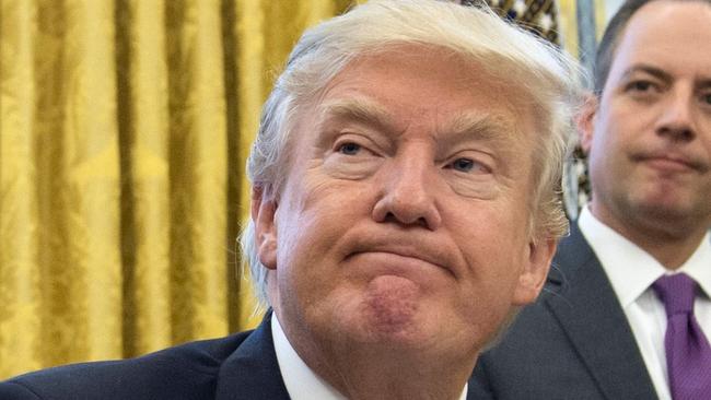 US President Donald Trump signed an executive order withdrawing the US from the Trans-Pacific Partnership trade deal. Picture: Saul Loeb/AFP