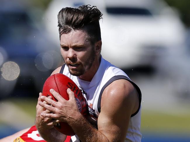 Southport's Fraser Pope in action at the NEAFL match between Southport and Redland on Saturday at the Southport Sharks. Picture: JERAD WILLIAMS