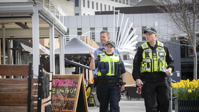 Tasmania Police Sgt. Sarah Crabtree, Transport Safety and Inspection Mark Kramer and Work Safe Tasmania Inspector Glenn Duncan at Salamanca Square. Picture: Chris Kidd