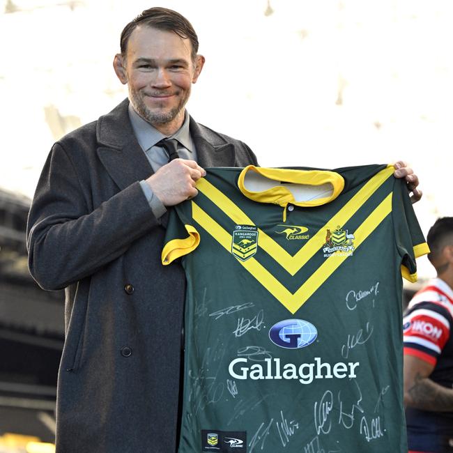 Forrest Griffin with a signed Kangaroos jersey. Picture: David Becker/Getty Images