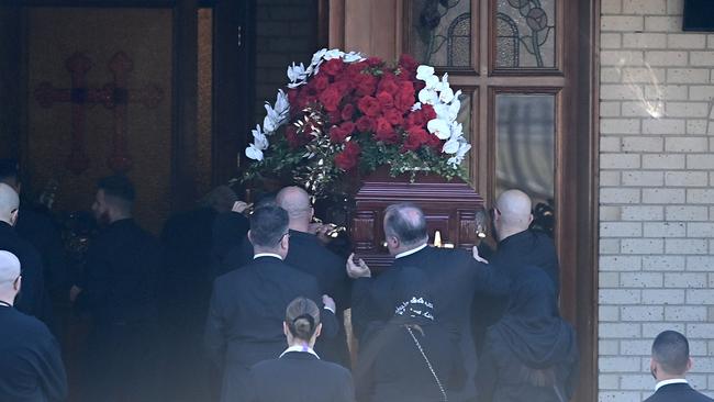 Alen Moradian’s casket is taken into the Greenfield Park church on Wednesday.