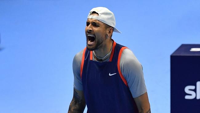 TURIN, ITALY - NOVEMBER 16: Thanasi Kokkinakis of Australia (out of frame) and Nick Kyrgios of Australia celebrate a point while playing Ivan Dodig of Croatia and Austin Krajicek United States in the doubles round robin during day four of the Nitto ATP Finals at Pala Alpitour on November 16, 2022 in Turin, Italy. (Photo by Valerio Pennicino/Getty Images)