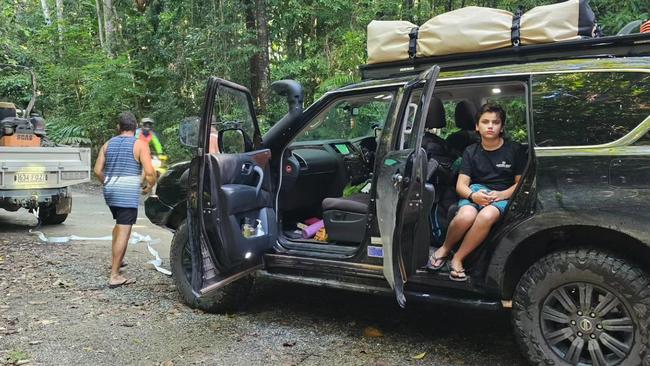 The family had to leave their car and caravan in Cairns while it was being repaired after breaking down at Cape Tribulation.