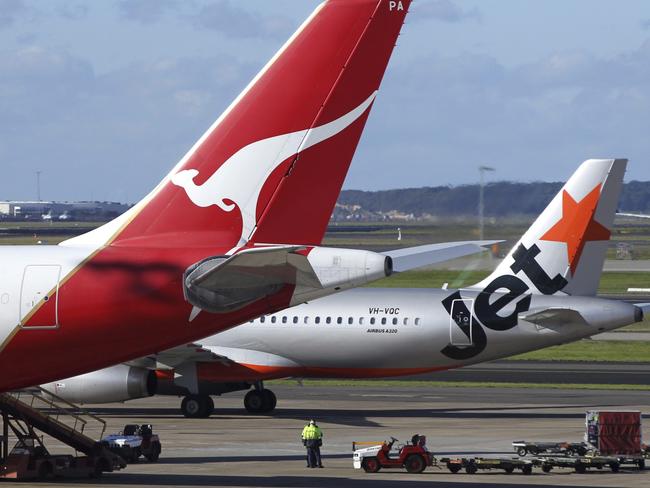 Paper boarding passes are soon to go on Qantas and Jetstar flights. Picture: EPA/Barbara Walton