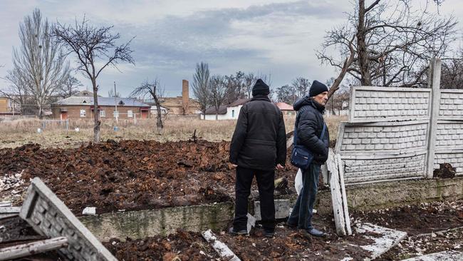 Residents inspect the damage following a Russian missile strike in the city of Kramatorsk, eastern Ukraine. Picture: AFP.