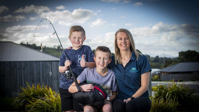 Brothers Mitch, 8 (left) and Max Tew, 9 with mother Jayne King. Picture: LUKE BOWDEN