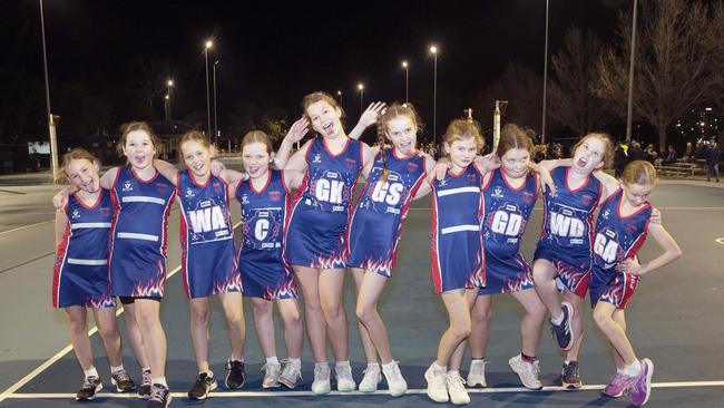 Port Red under-11 netball team pull their funniest faces. Picture: Alan Barber