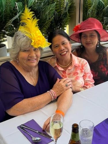 Jennifer Sua, Conchita Arolley, and Liz MacKellar celebrating the Melbourne Cup at Gympie RSL Club.