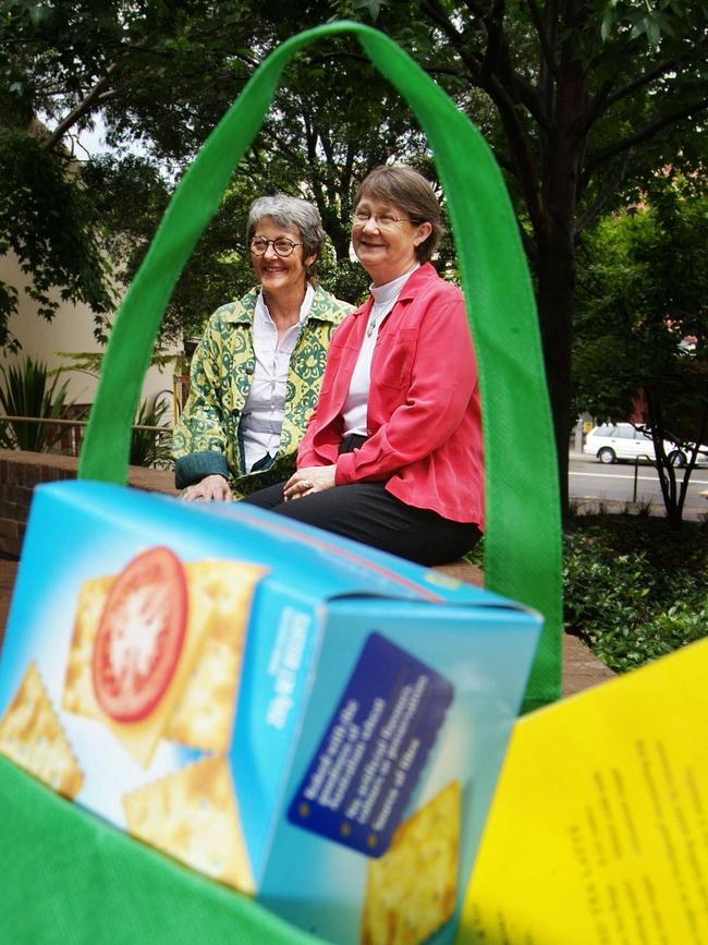 Carol Dettmann (right), pictured collecting shopping bags of food for refugees at North Sydney Oval in 2015.