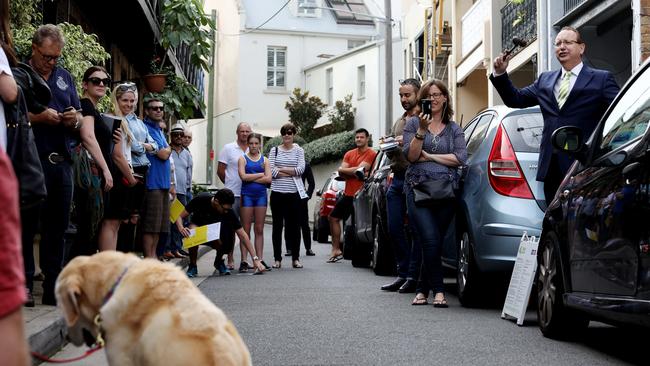 Bidders and onlookers during the auction at 23 Bennett St, Surry Hills, Sydney, Australia, 25 March 2017. Photo by Brianne Makin