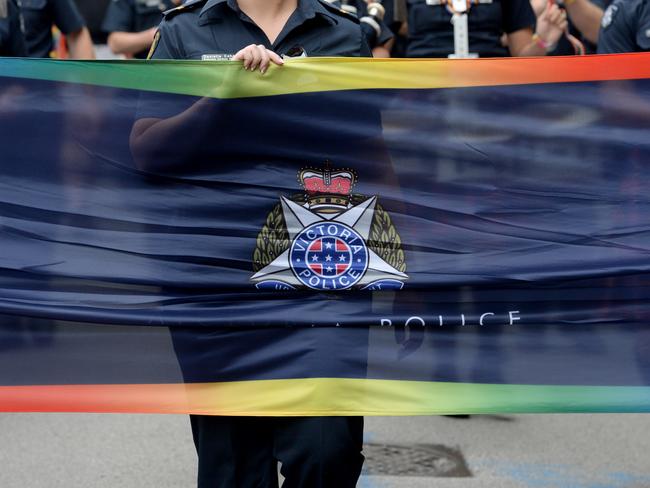 Victoria Police members walk in the Pride March along Fitzroy Street St Kilda. Picture: Andrew Henshaw