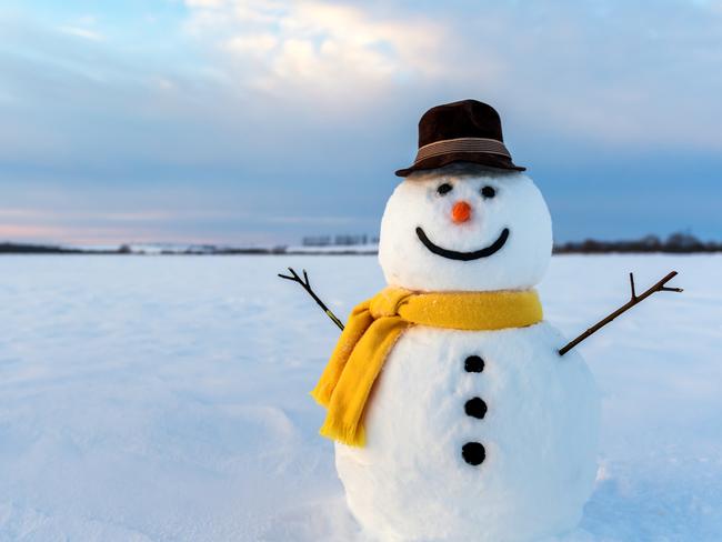 snowman on orange sunset background