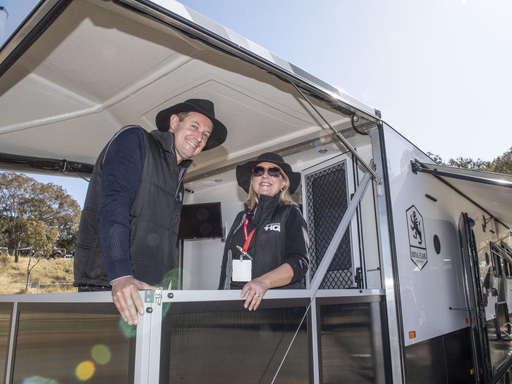 Michael Higgs and Fiona Bann from Caravan HQ relax on the deck of the Royal Flair at the Queensland Outdoor Adventure Expo, Toowoomba Showgrounds. Friday, July 29, 2022. Picture: Nev Madsen.