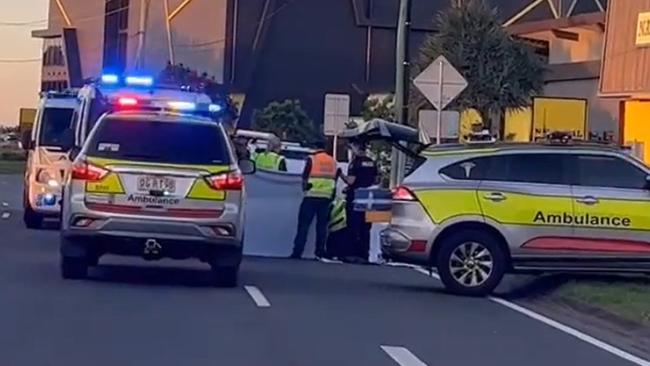 Emergency services outside Harbour Town at Biggera Waters after a UK man, 57, was struck and killed by a Holden Colorado ute while crossing Oxley Dr. Picture: 9 News